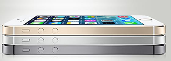 One grey, one silver and one rose gold iPhone stacked on top of each other.