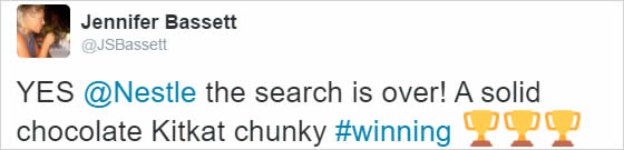 A screenshot of a tweet from Jennifer Bassett, with the text "YES @Nestle the search is over! A solid chocolate Kitkat chunky #winning", followed by three trophy emoji.
