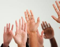 https://www.rocketseed.com/wp-content/uploads/2016/10/Technical-faqs-HUB.jpg A close up of a group of raised hands.