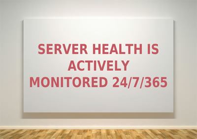 A simulated artwork on a gallery wall, with the words "SERVER HEALTH IS ACTIVELY MONITORED 24/7/365" printed onto it in red.