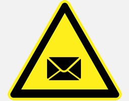Icon showing an unopened envelope inside a yellow triangle.