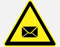 Icon showing an unopened envelope inside a yellow triangle.