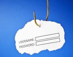 A piece of paper on a metal hook, with the words "Username" and "Password" written on it.