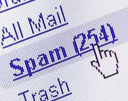 A selection hand hovers over a link titled "Spam (254)".