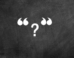 A white question mark in quotation marks over a textured blackboard background.